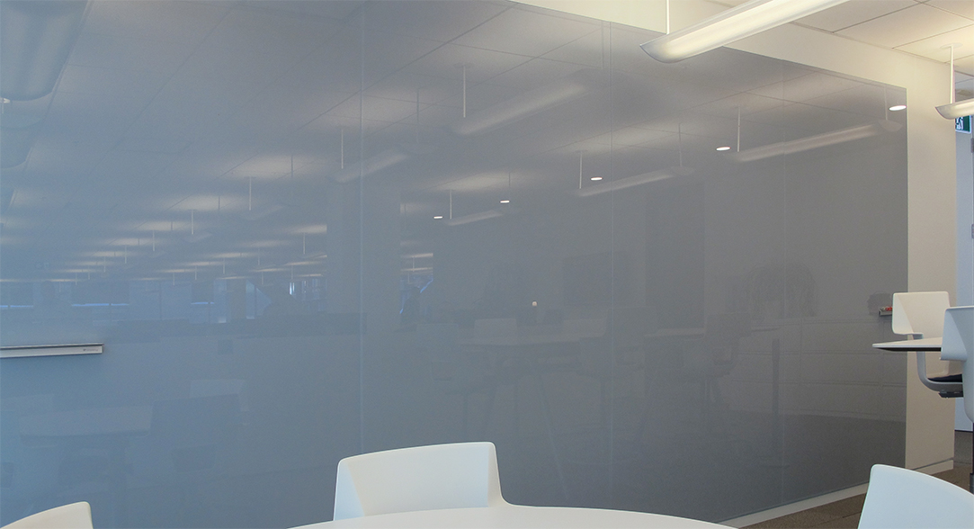 Wall-to-Wall Application of Magnetic Glass Boards Back Painted Grey (Standard Colour #T-537 Haze)