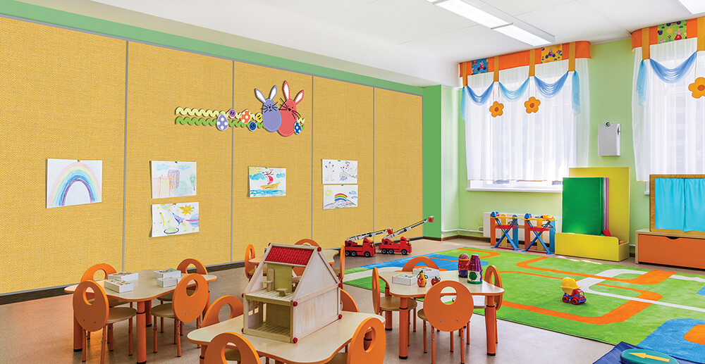 Daycare centre with several fabric boards on a wall